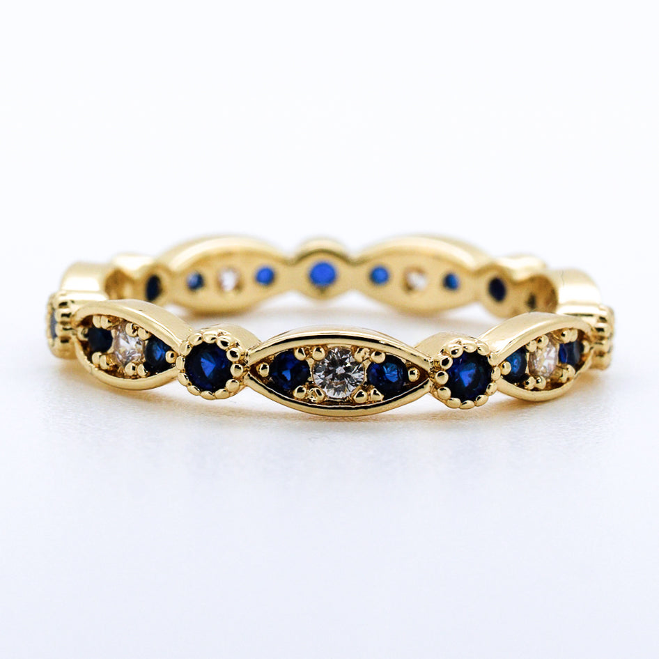 Anillo de oro 14k con diamantes de laboratorio y zafiros azules