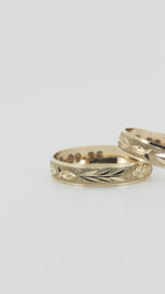Video de las argollas de matrimonio de oro amarillo 10k diseño Abundancia de MOOM
